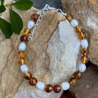 an image of a Amber and Pearl Beaded Bracelet with sterling silver lobster clasp