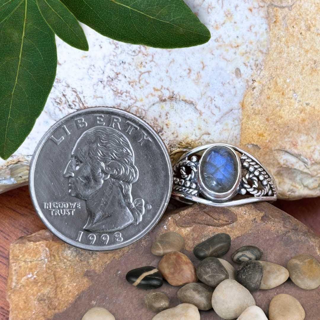 an image of a Oval Labradorite and Oxidized Sterling Silver Ring next to a quarter