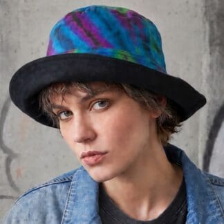 an image of a Tie Dye Cotton Bucket Hat with the brim turned up on an AI generated model