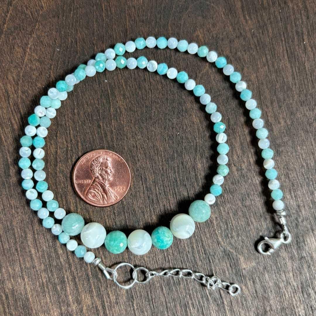 an image of a Amazonite and Mother of Pearl Beaded Choker Necklace next to a penny