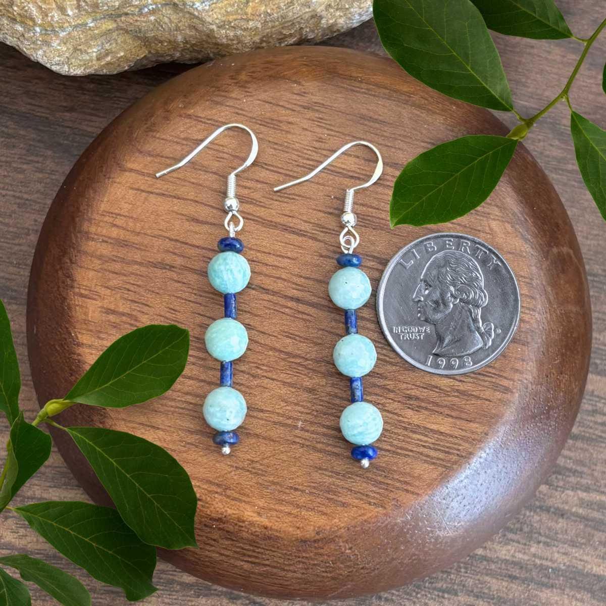 an image of a pair of Amazonite and Lapis Lazuli Earrings next to a quarter