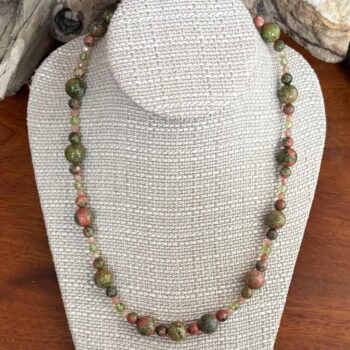 an image of a gemstone beaded necklace that is 19 inches long and has Unakite with Peach Moonstone and Peridot beads