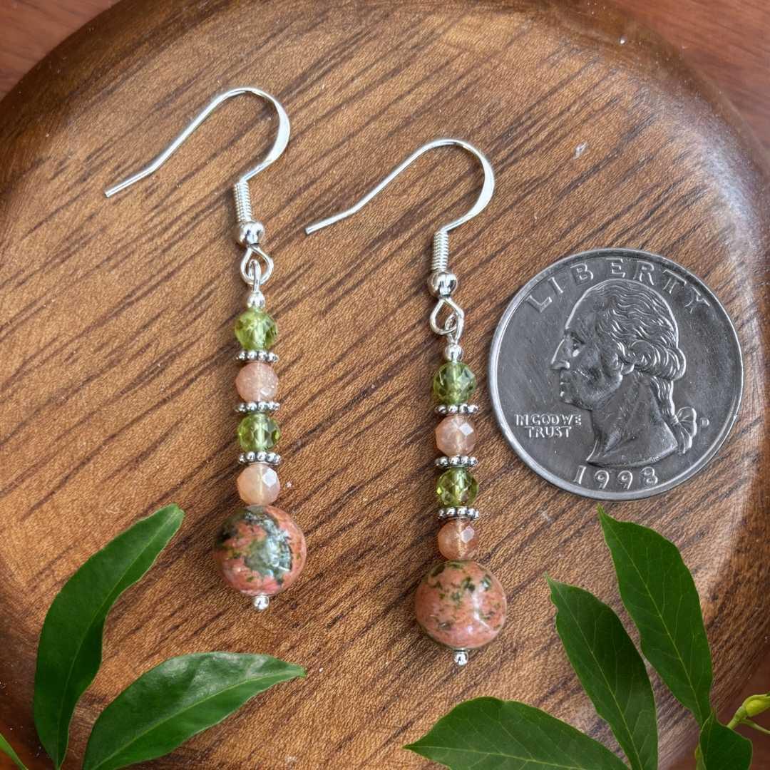 an image of a pair of Unakite with Peridot and Peach Moonstone Beaded Gemstone Dangle Earrings next to a quarter