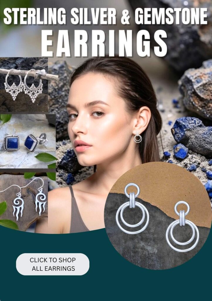 A model wearing a pair of post earrings with double silver circles hanging as well as a pair of small sterling silver ornate beaded click hoops, a pair of square lapis lazuli and sterling silver stud earrings and a pair of dangle silver earrings with what looks like silver flames hanging. Click image to shop all earrings