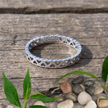 an image of a Sterling Silver Dainty Open Wraparound Hearts Ring with up and down open hearts that wrap all around the ring.
