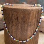 an image of a mixed faceted gemstone beaded necklace