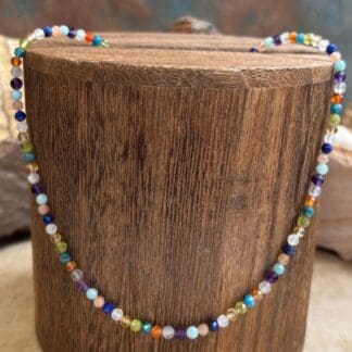 an image of a mixed faceted gemstone beaded necklace