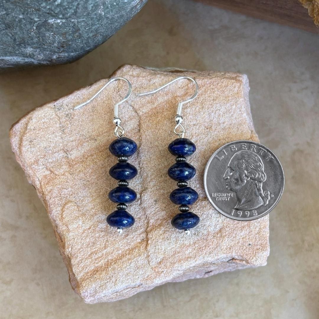 an image of a pair of Rondelle Lapis Lazuli and Sterling Silver Earrings with four rondelle beads separated by oxidized small sterling beads.