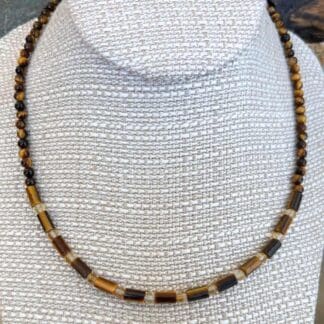 an image of a Tiger's Eye and Citrine Choker Necklace consisting of tiger's eye small tube beads separated by 4mm faceted citrine beads and finished with 4mm round tiger's eye beads going up the neck to the back