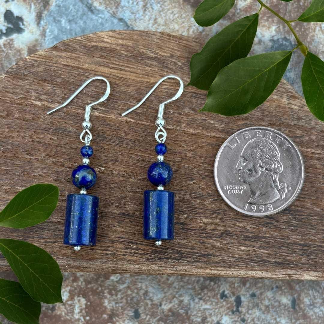 an image of a pair of Lapis Lazuli and Sterling Beaded Earrings next to a quarter. The earrings are 1.75 inches long from top of earring hook